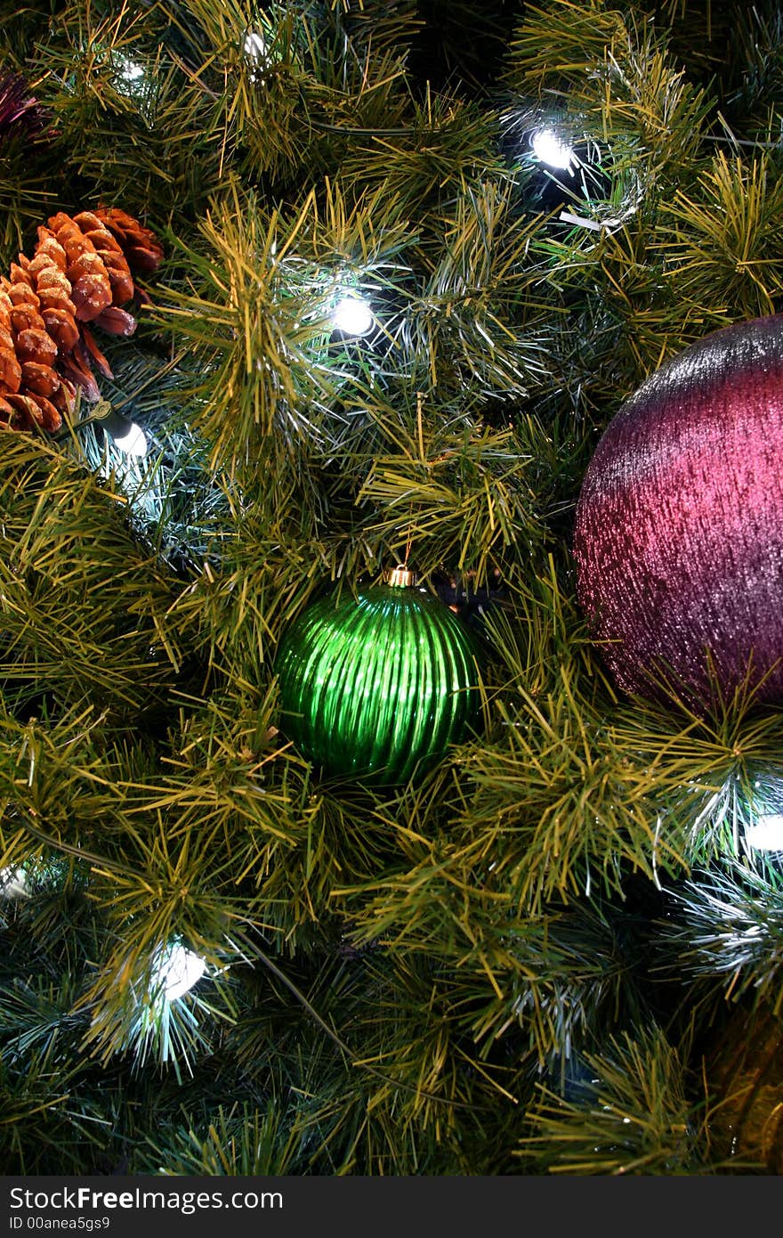 Christmas Tree Ornaments with Lights and Pine Cones