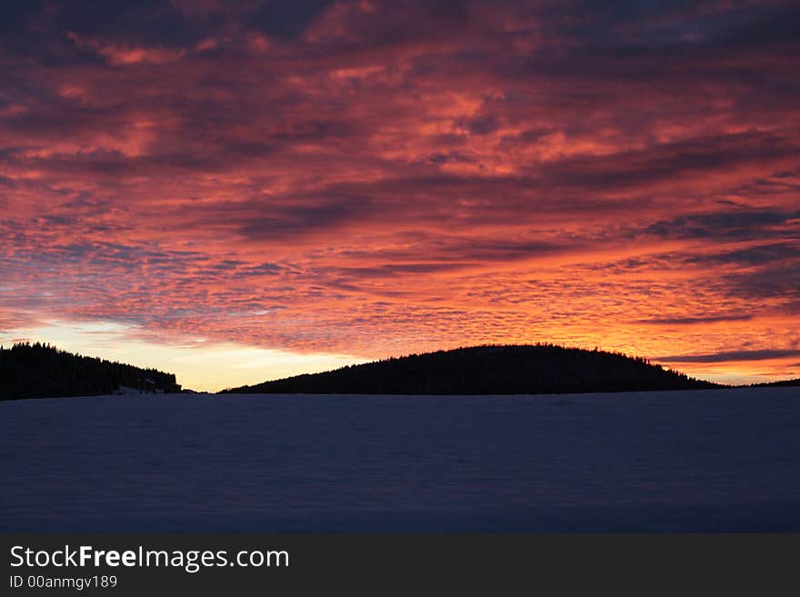 Sunset over snowy mountain in France. Sunset over snowy mountain in France