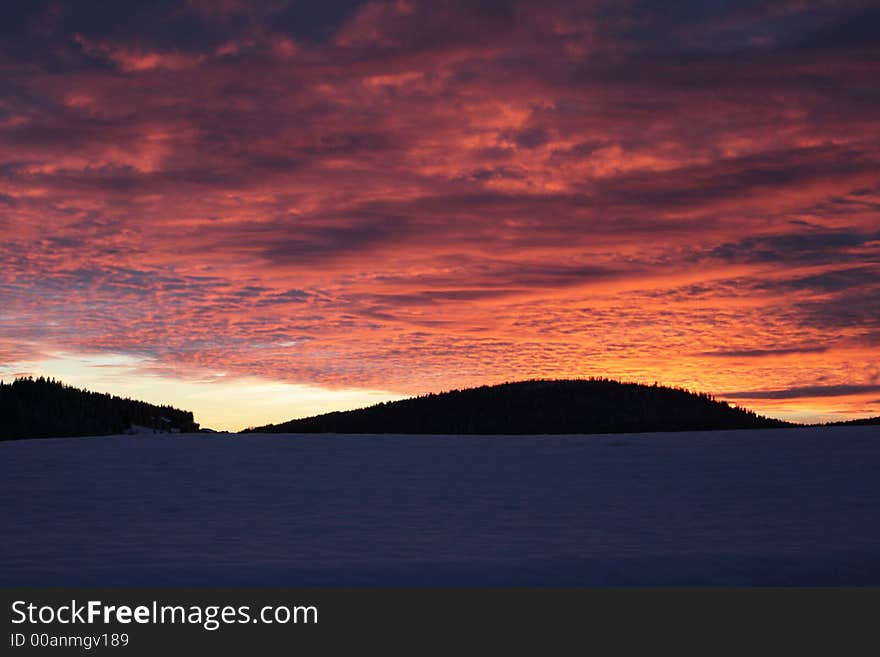 Sun over snow