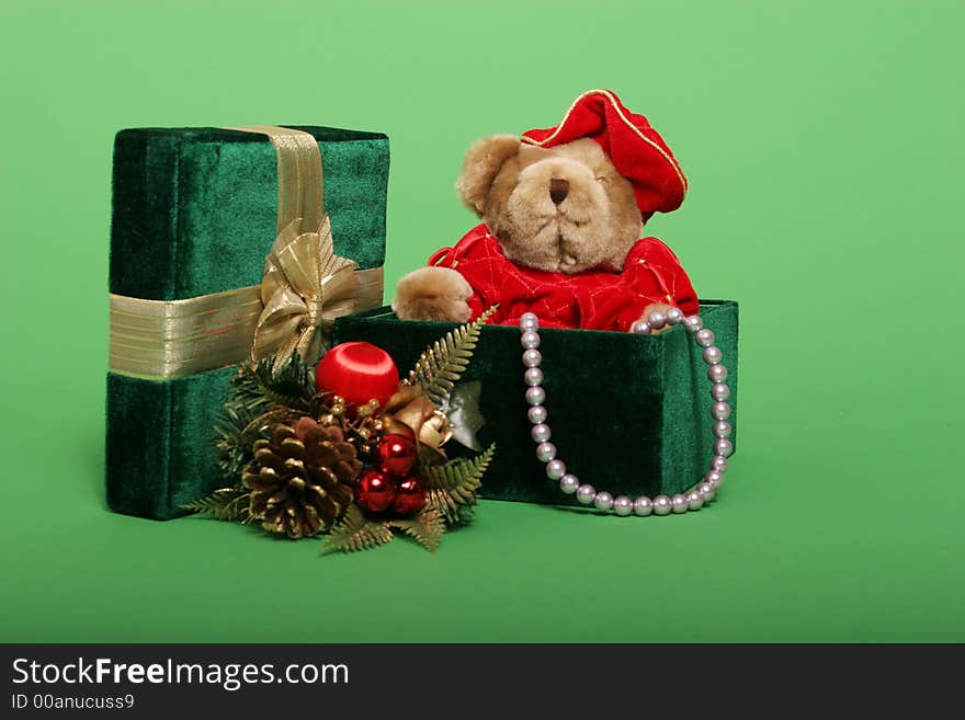 Christmas presents, teddy bear and pearls