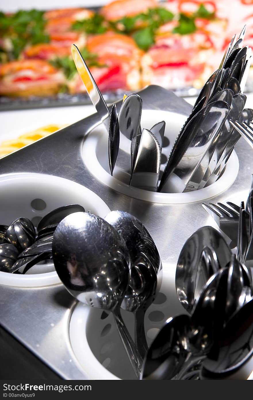 Table setting with forks knives and spoons. Table setting with forks knives and spoons