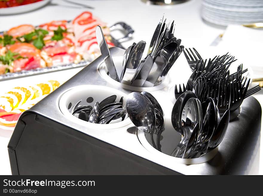 Table setting with forks, knives and spoons. Table setting with forks, knives and spoons