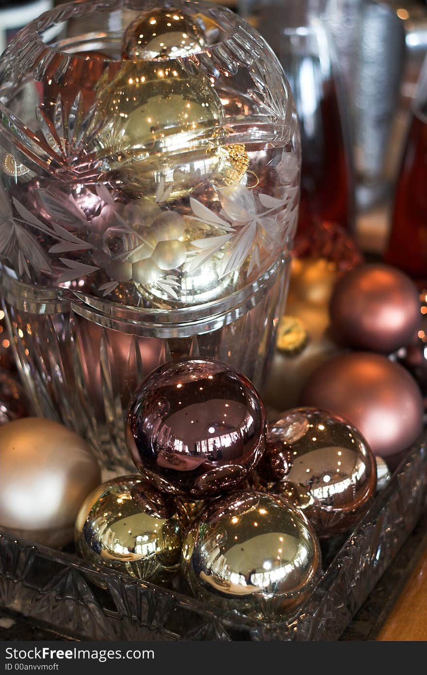 Arrangement of christmas ornaments in crystal tray with crystal jar. Arrangement of christmas ornaments in crystal tray with crystal jar