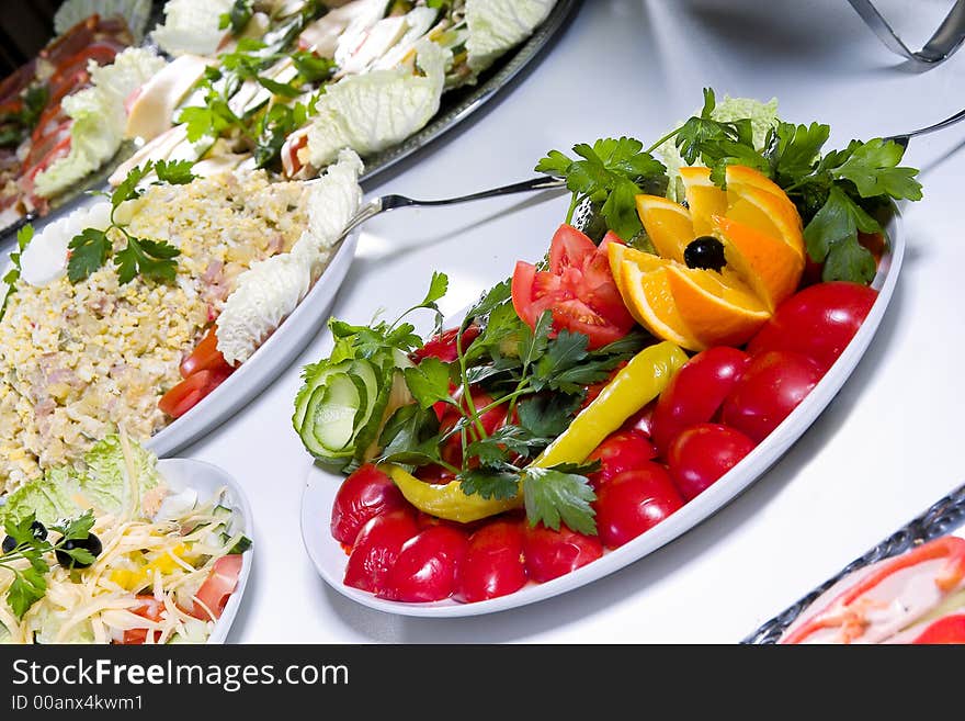 Delicious salad made from saulty tomatoes and cucmbers with pepperoni. Delicious salad made from saulty tomatoes and cucmbers with pepperoni