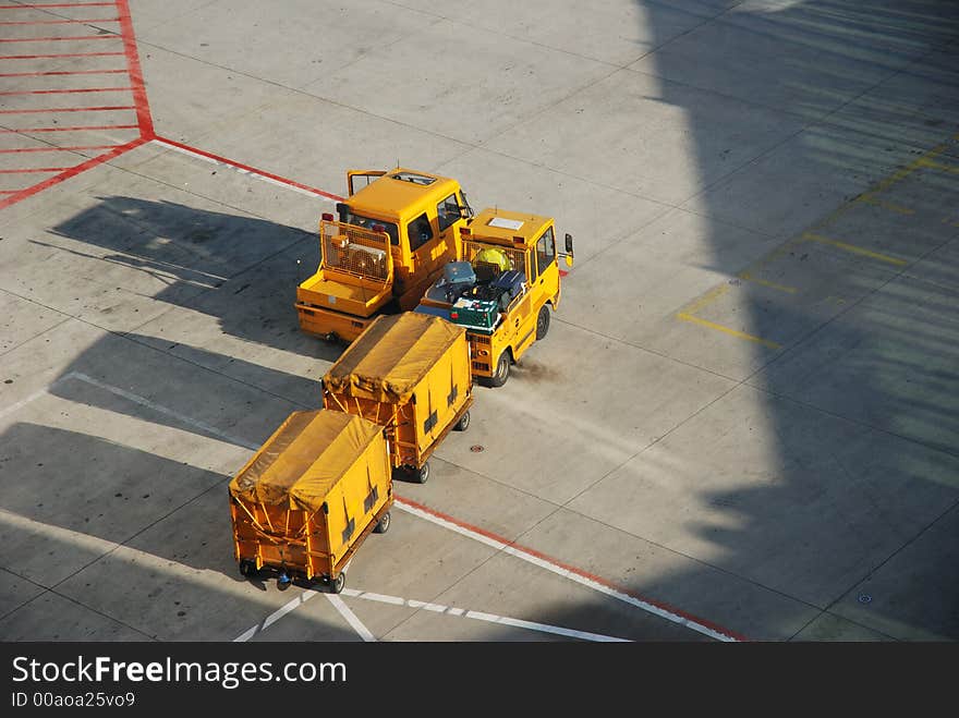 Luggage carts on apron, Munich airport, Germany