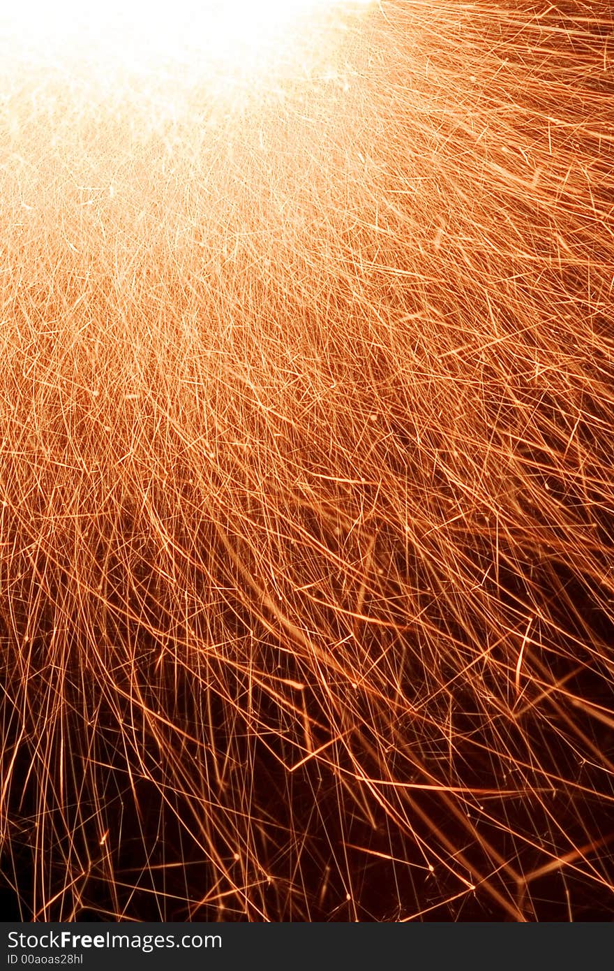 Detail view of a sparkler at night