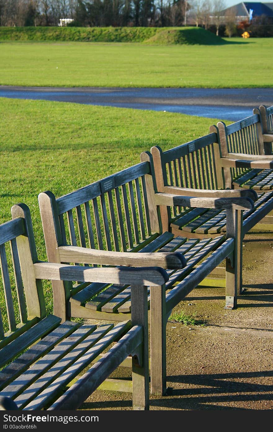 Row of deserted benches in park. Row of deserted benches in park