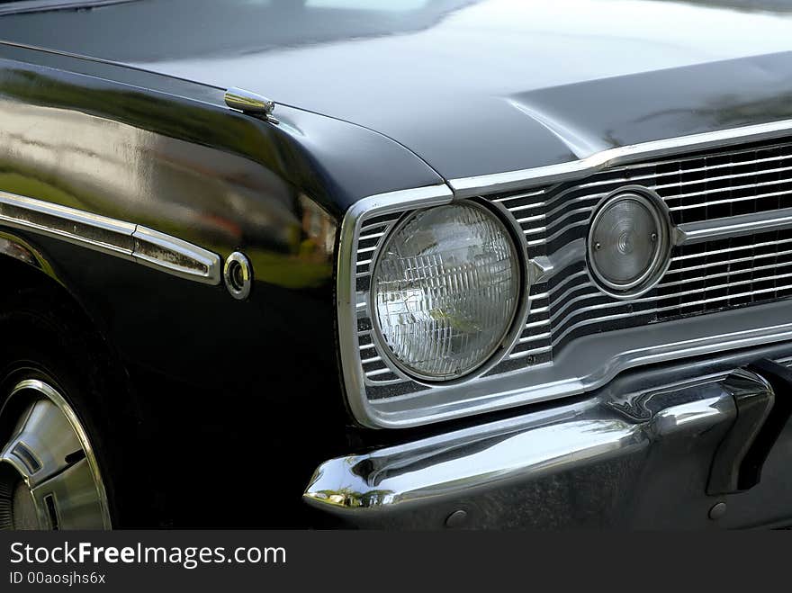 Headlights and grille of a classic car