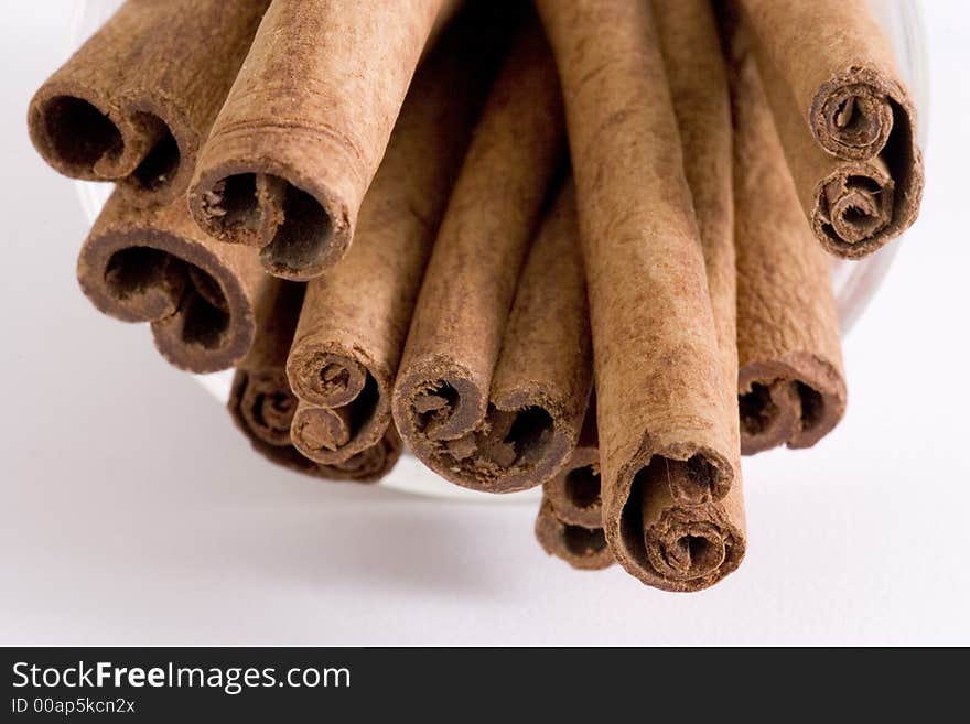 Cinnamon sticks on a white background. Cinnamon sticks on a white background