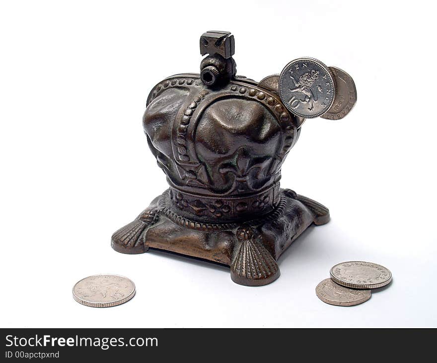 Brass money box with coins