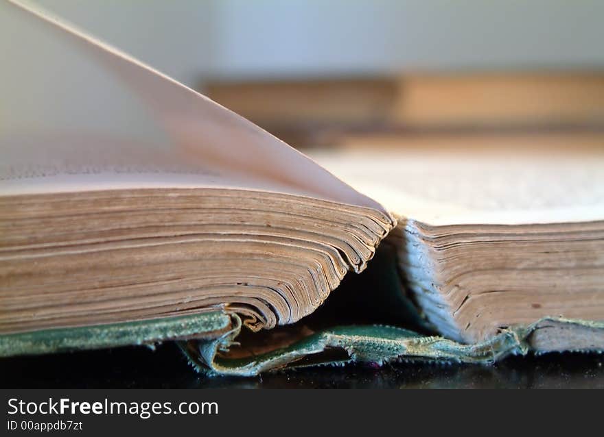 Photo of an open antique book. Photo of an open antique book