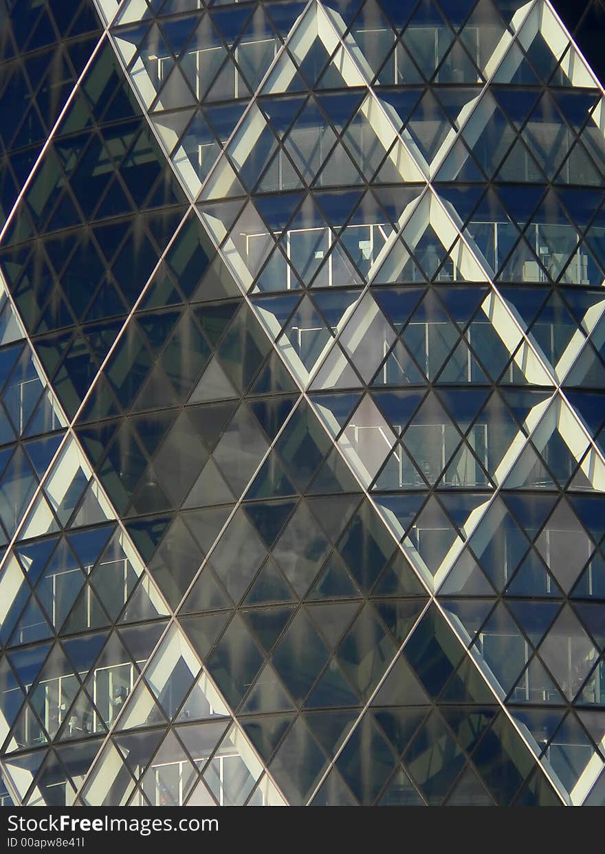 Glass Facade ofGherkin Building in London. This famous modern office building is made by Norman Foter.