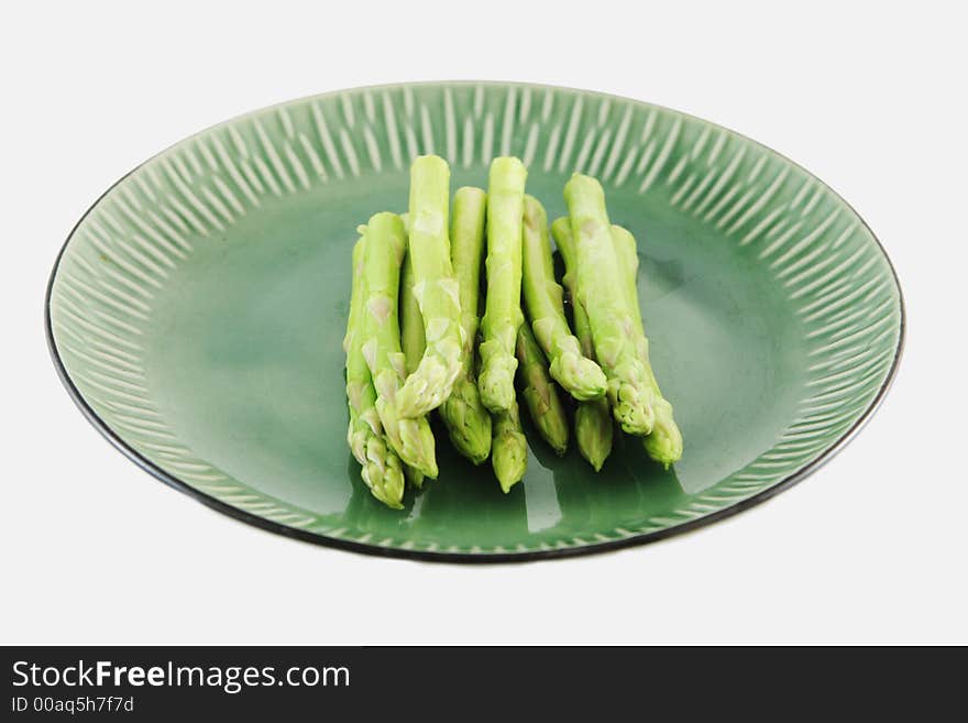 Fresh asparagus shoots on a plate