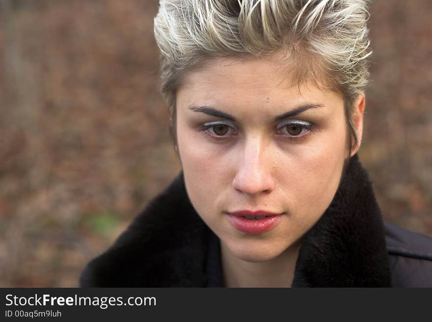 Portrait of a business woman outdoor in a park with various expressions. Portrait of a business woman outdoor in a park with various expressions