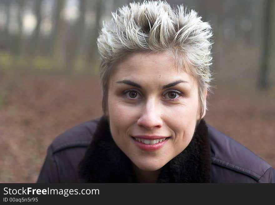 Portrait of a business woman outdoor in a park with various expressions. Portrait of a business woman outdoor in a park with various expressions