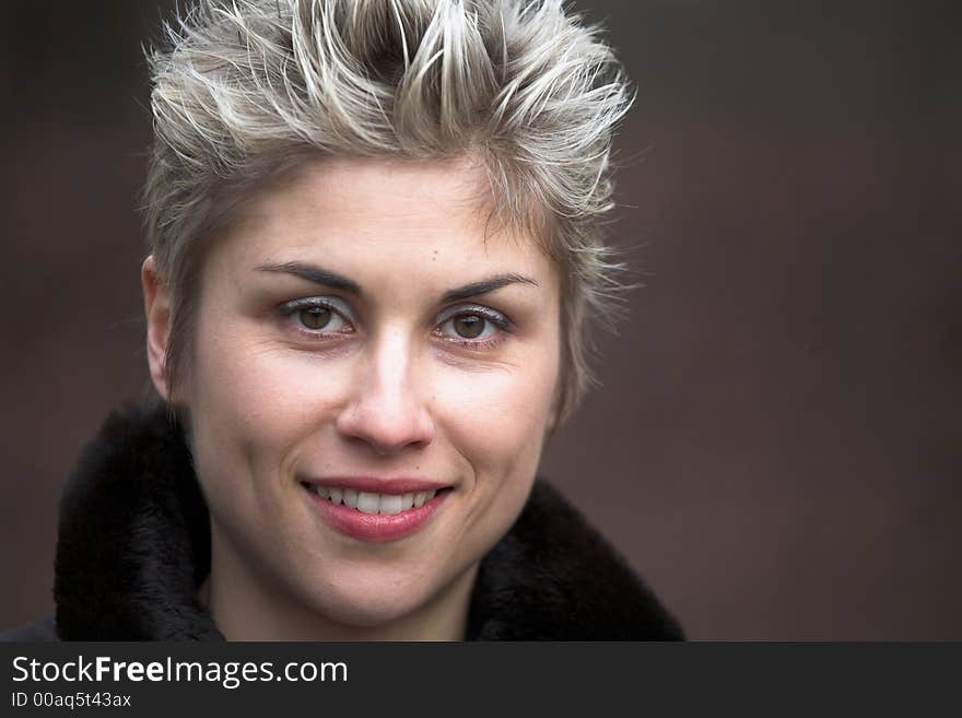 Portrait of a business woman outdoor in a park with various expressions. Portrait of a business woman outdoor in a park with various expressions