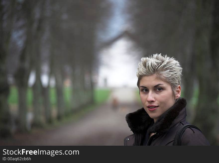 Portrait of a business woman outdoor in a park with various expressions. Portrait of a business woman outdoor in a park with various expressions