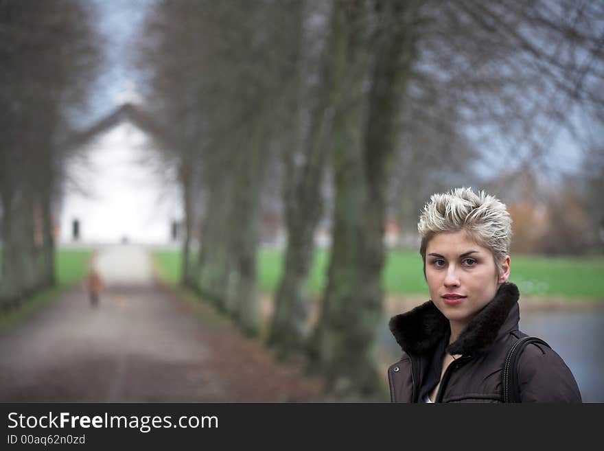 Portrait of a business woman outdoor in a park with various expressions. Portrait of a business woman outdoor in a park with various expressions