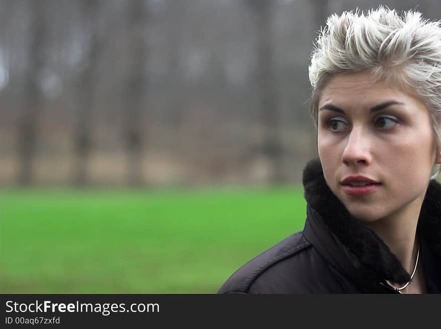 Portrait of a business woman outdoor in a park with various expressions. Portrait of a business woman outdoor in a park with various expressions