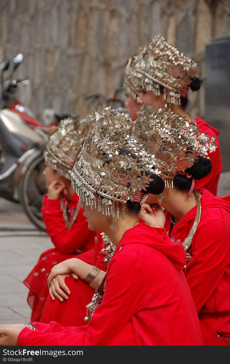 Lady dancers with siver headgear waiting for their peformance. Lady dancers with siver headgear waiting for their peformance