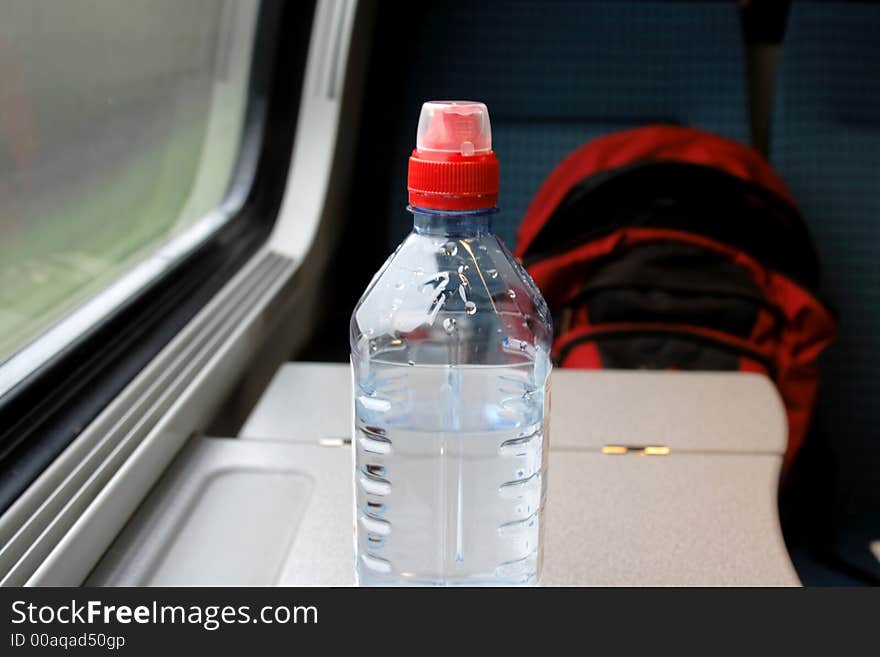 Travelling by Train (with Water and Knapsack). Travelling by Train (with Water and Knapsack)