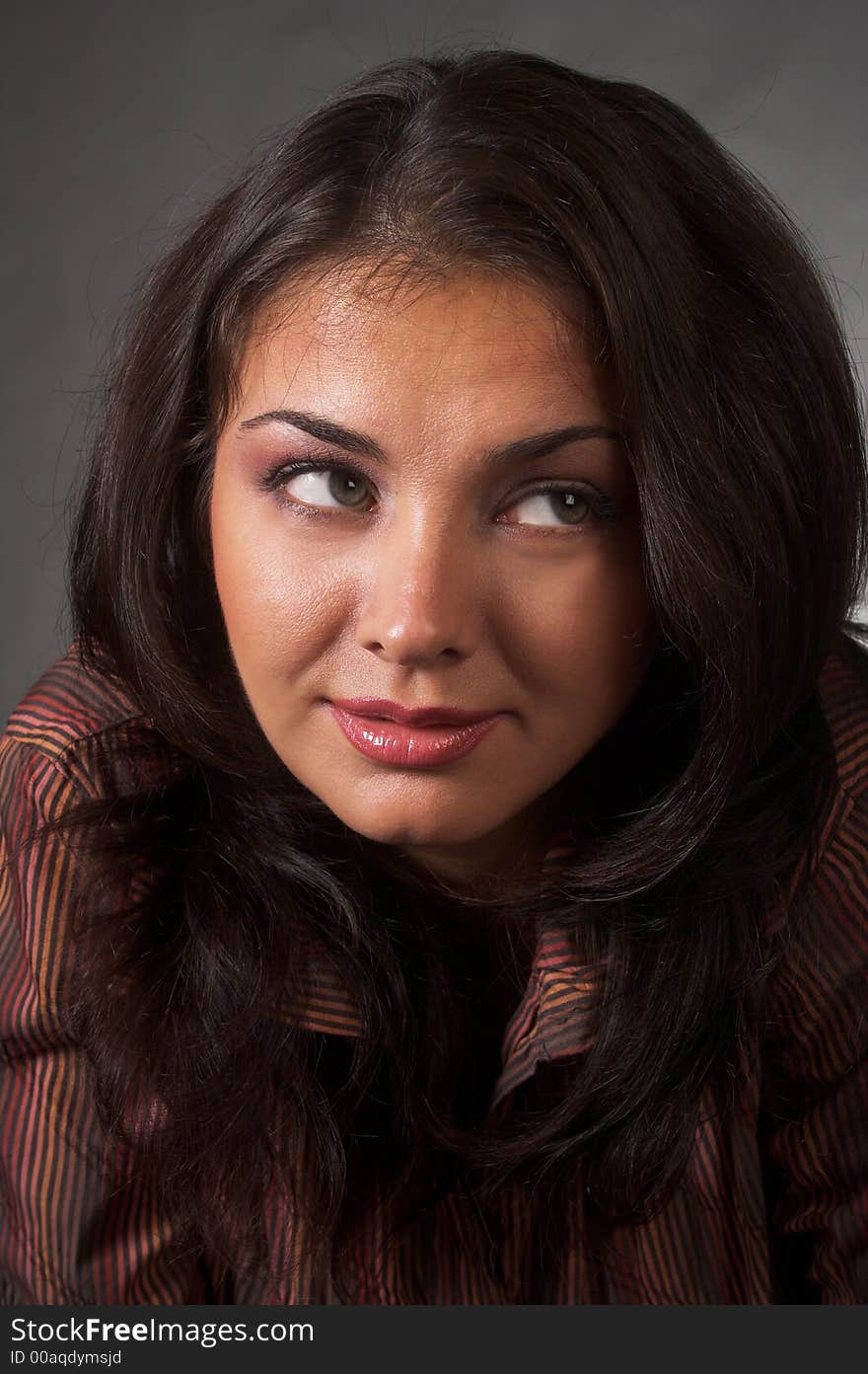 Closeup portrait of friendly brunette. Closeup portrait of friendly brunette