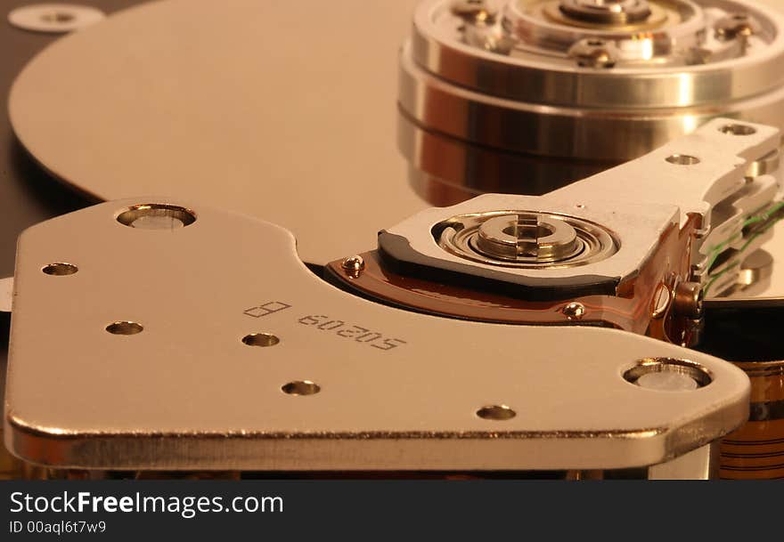 Internals of a Hard Disk showing the head on one plate