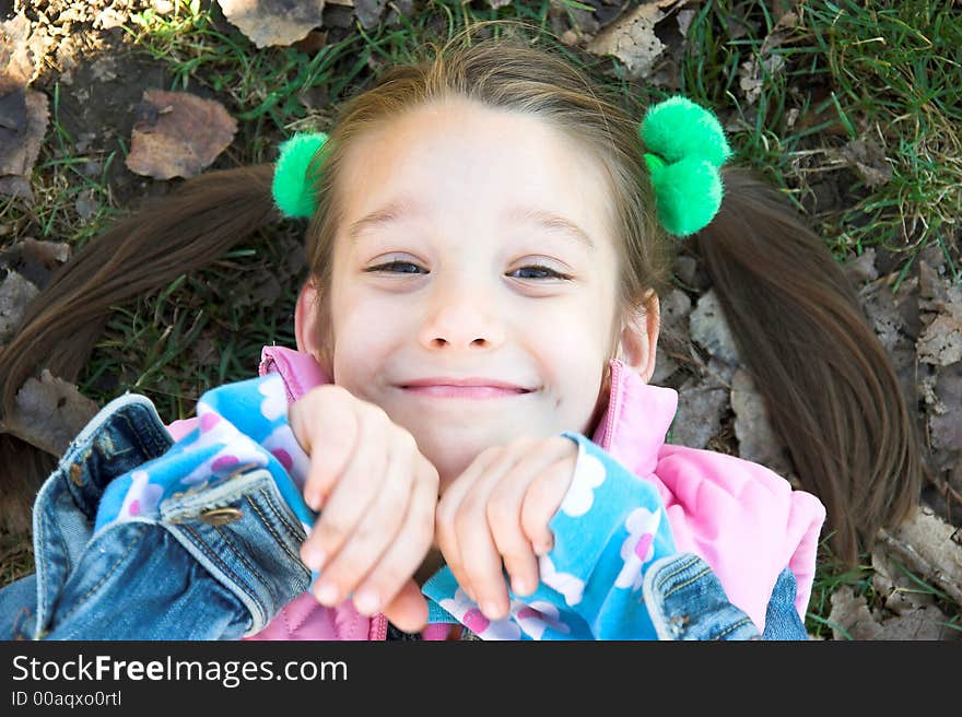 A little pretty child relaxing in the park