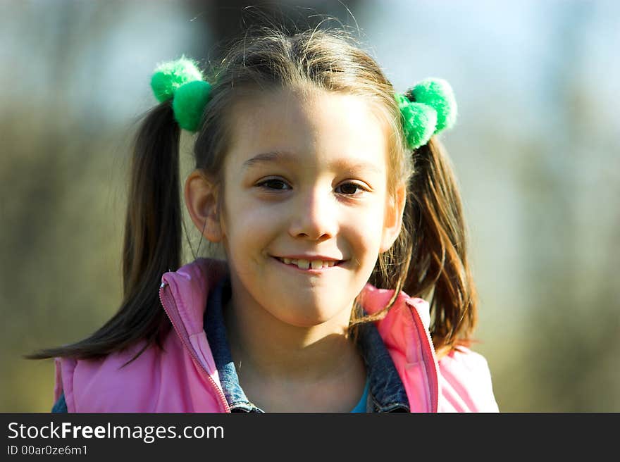 Young pretty child in the park