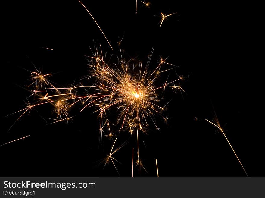 Detail view of a sparkler at night