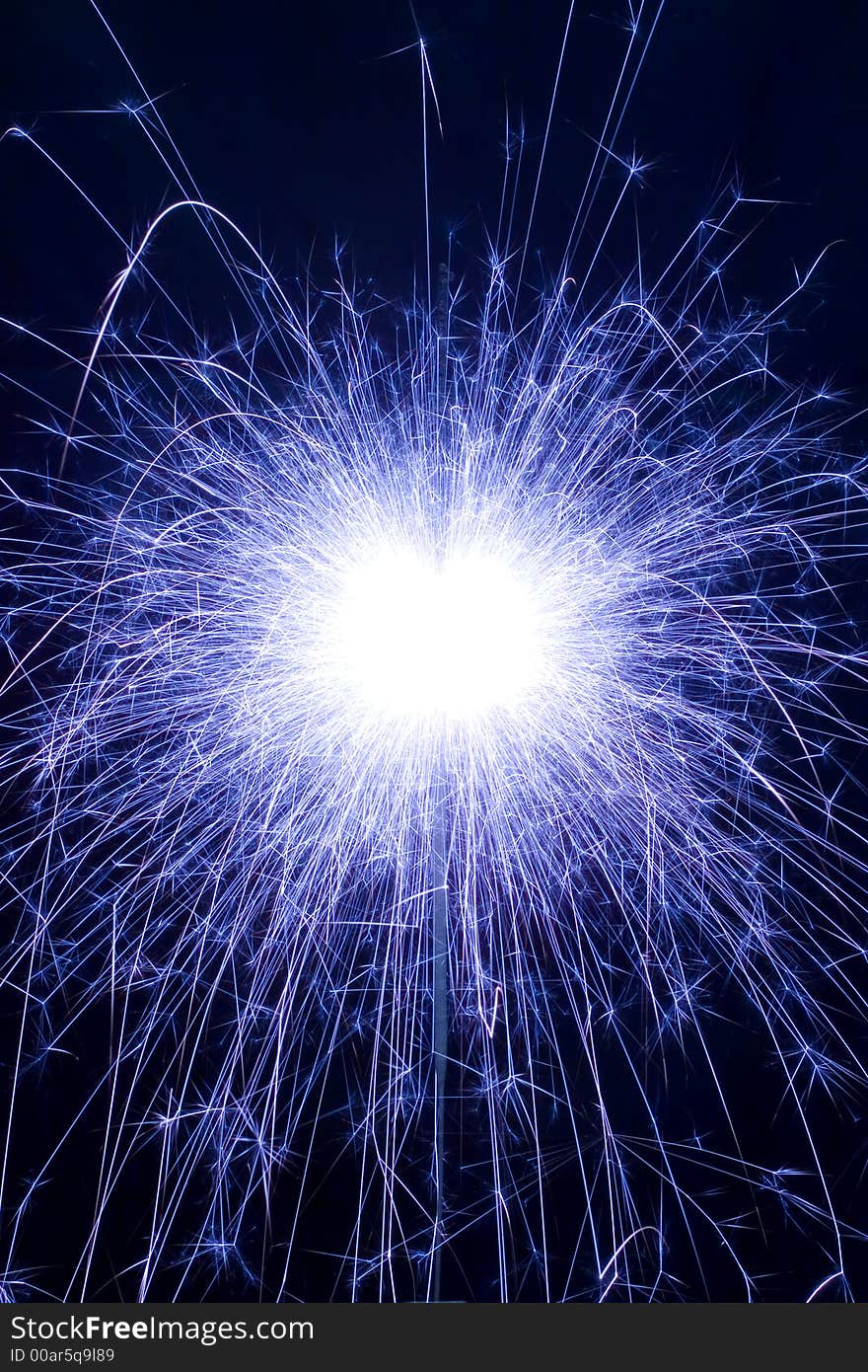 Detail view of a sparkler at night