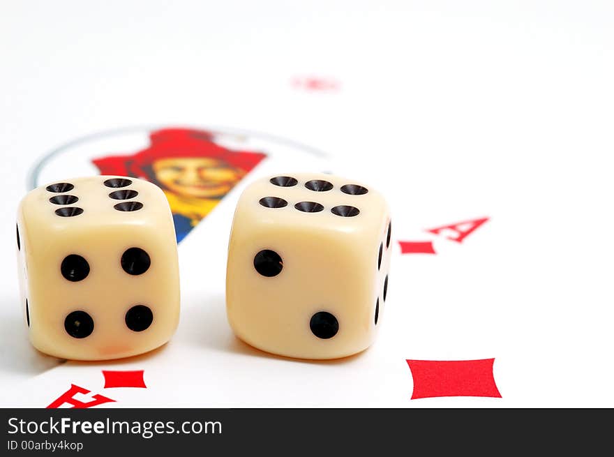 Dices and play cards in white background