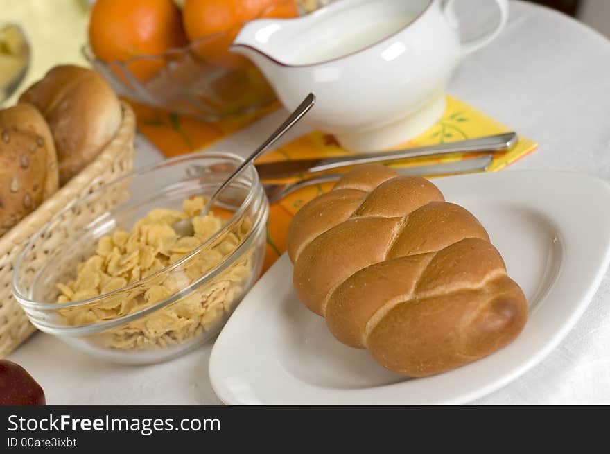 Bread on a plate with corn flakes in background. Bread on a plate with corn flakes in background