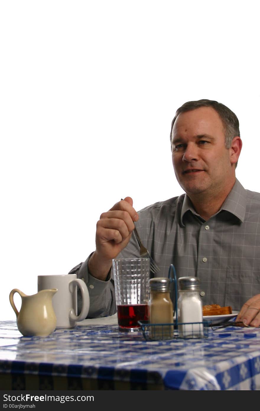 Man sitting in diner or cafe eating. Man sitting in diner or cafe eating