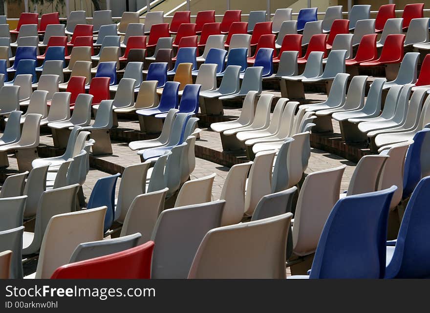 Colourful Empty Stadium Seats In Rows