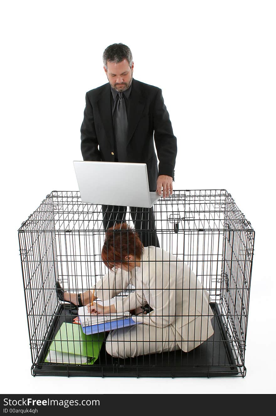 Thirty something business woman trapped in cage. Thirty something business woman trapped in cage.