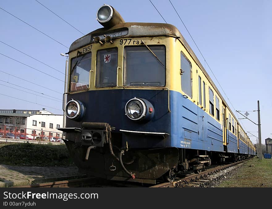 Vintage blue and yellow train on a station, Poland