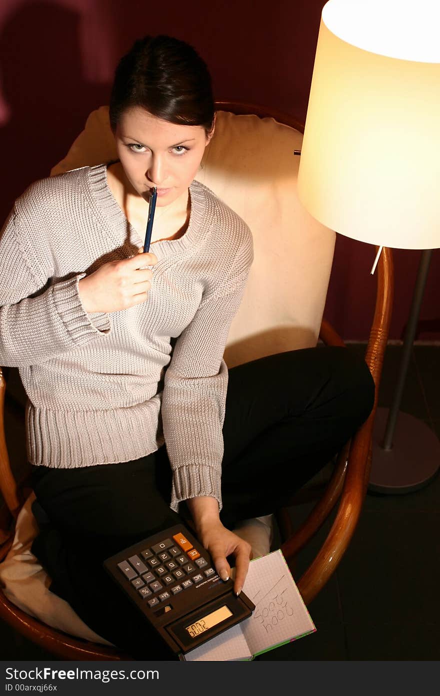 Woman with calculator