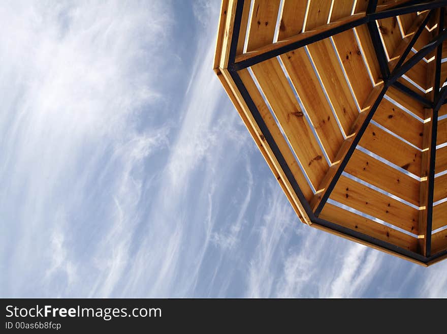 Parasols On A Cloudy Sky