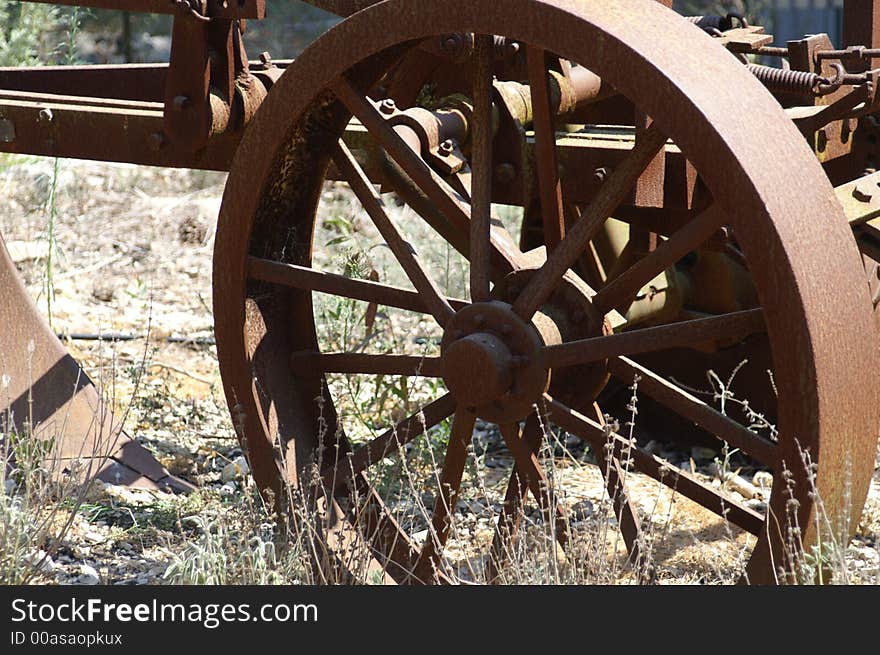 Old wheel  - a part of rust plow