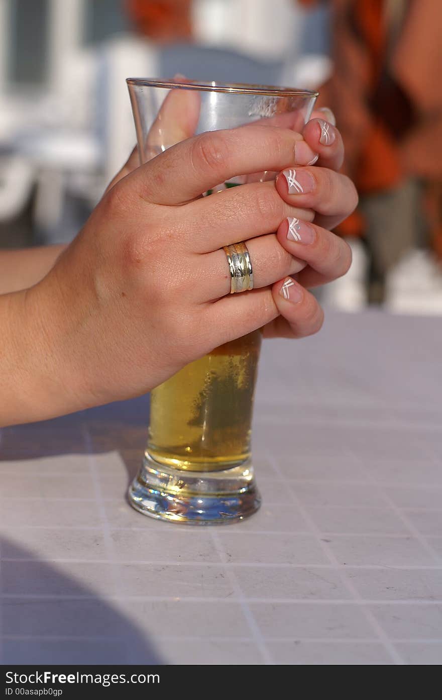 A woman drinking beer