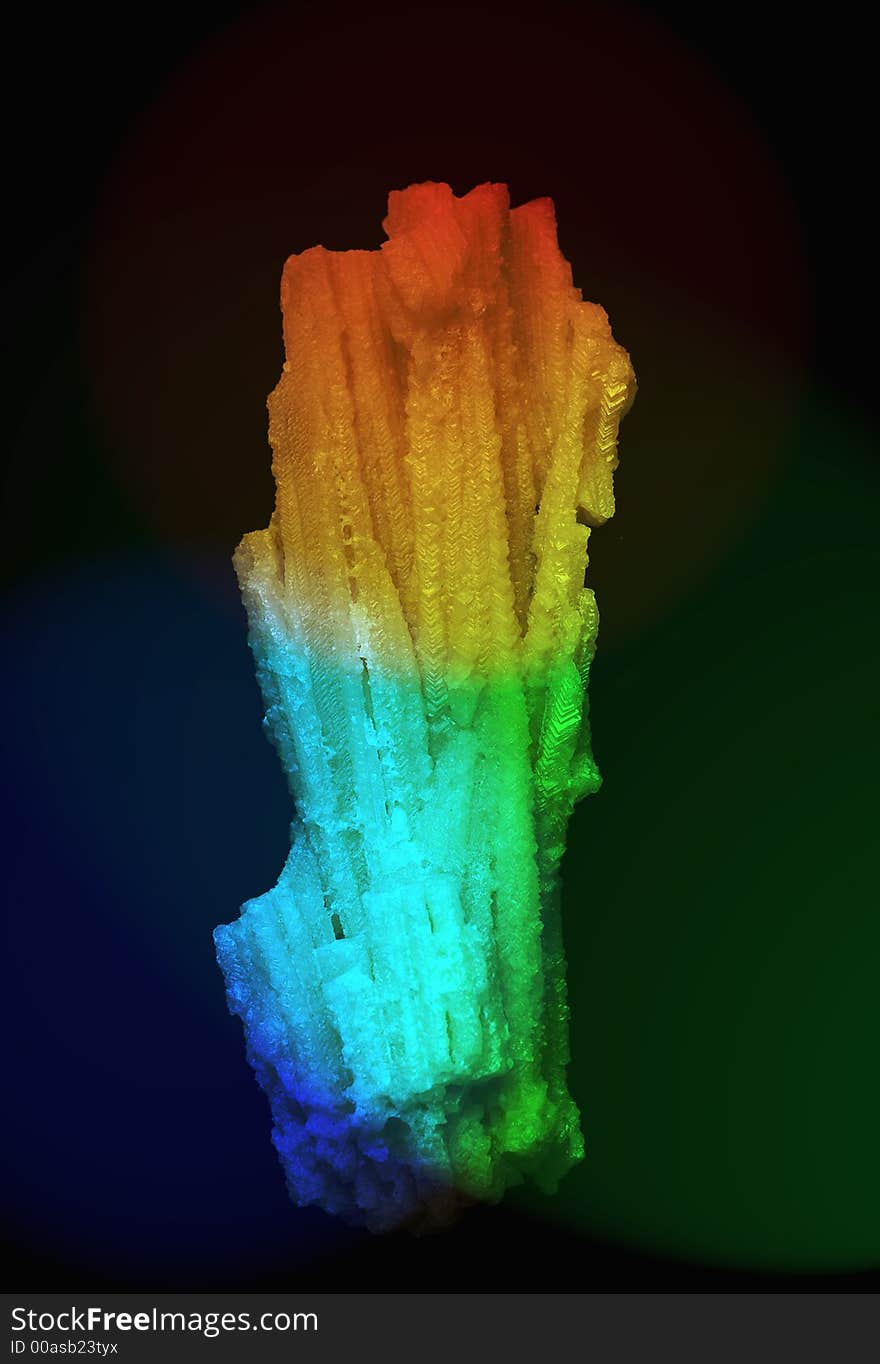 Stalactite from a cave on a black background