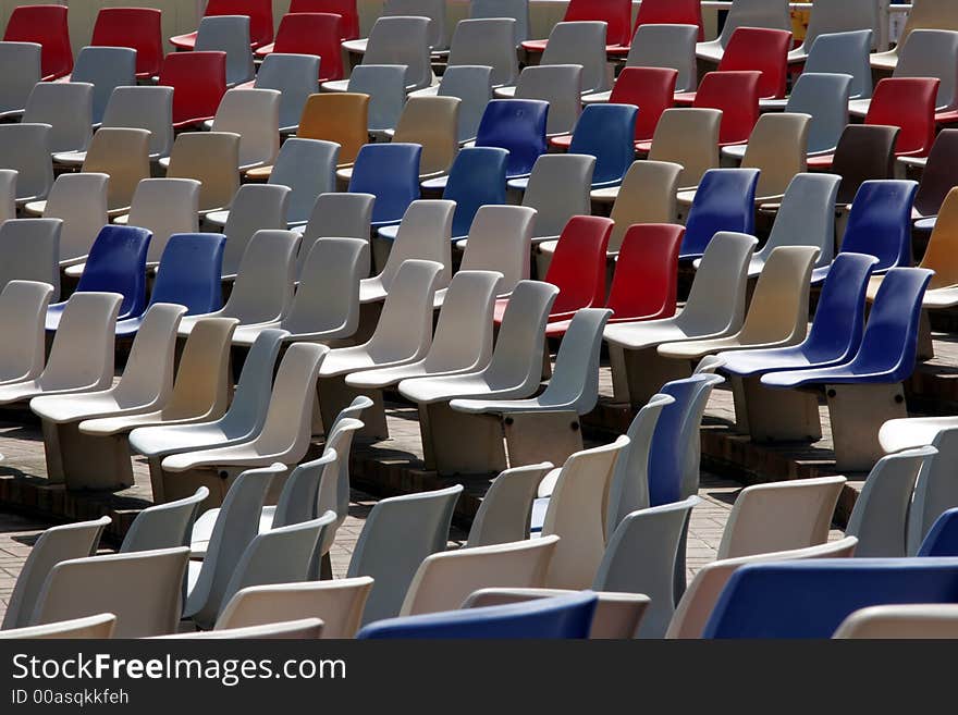 Colourful Empty Stadium Seats In Rows