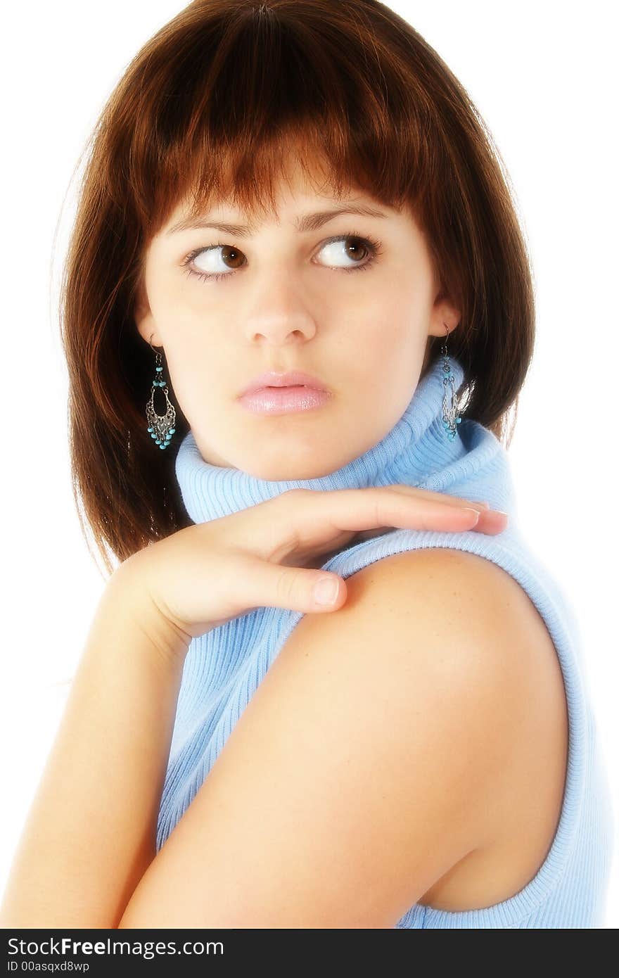 Beautiful young woman looking over shoulder