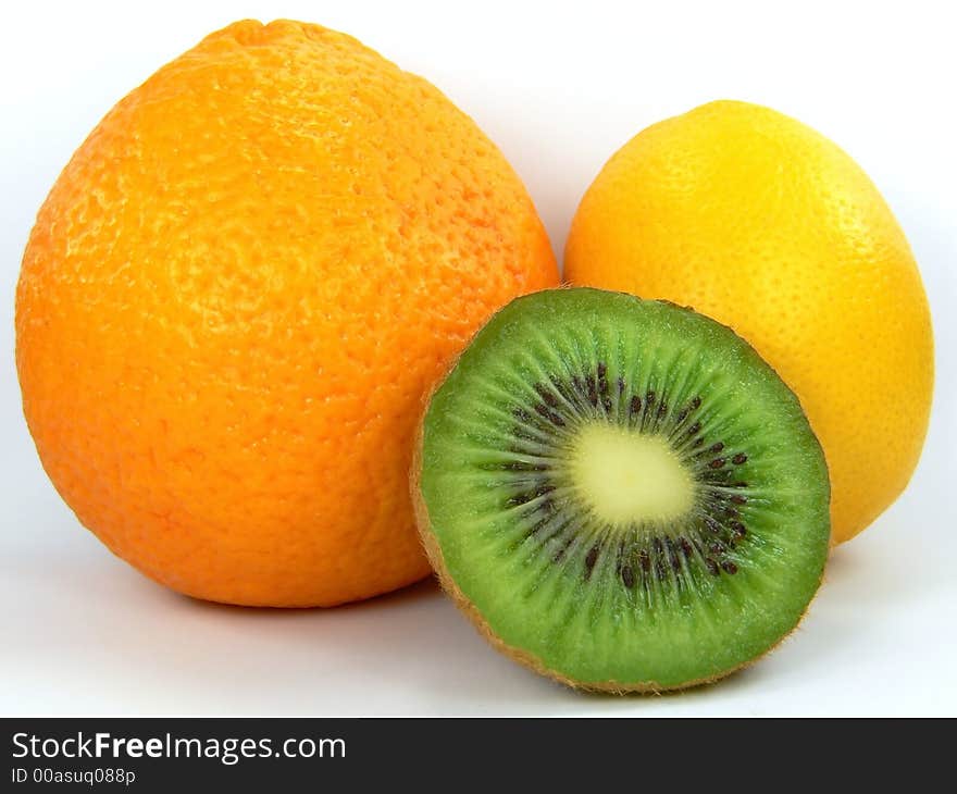 Orange, lemon and kiwi on white background. Orange, lemon and kiwi on white background