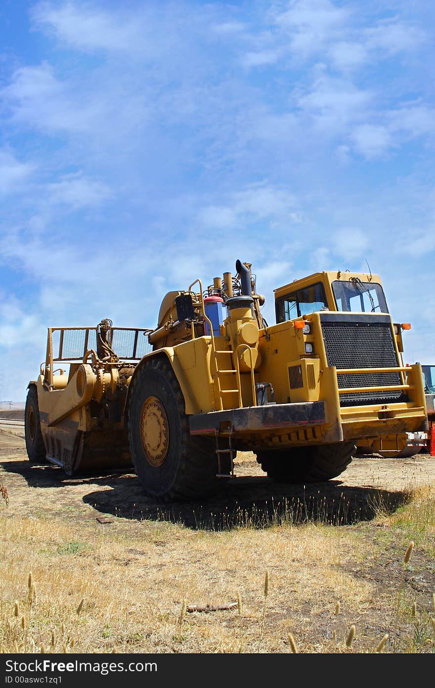 Large yellow earth moving equipment. Large yellow earth moving equipment