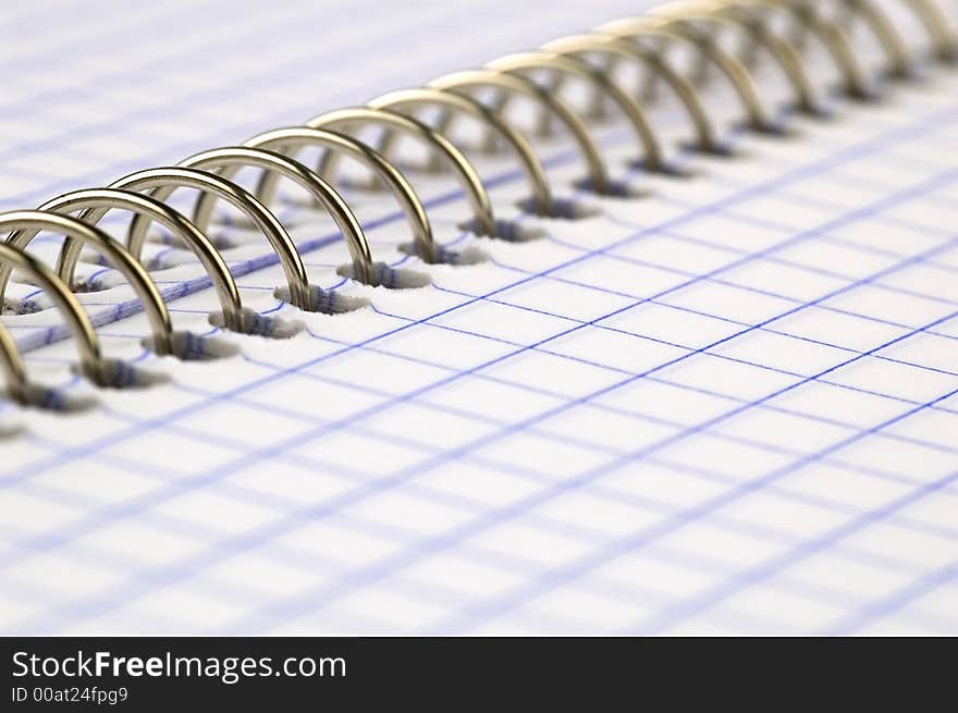 Close up of a spiralled notebook with shallow dof. Close up of a spiralled notebook with shallow dof