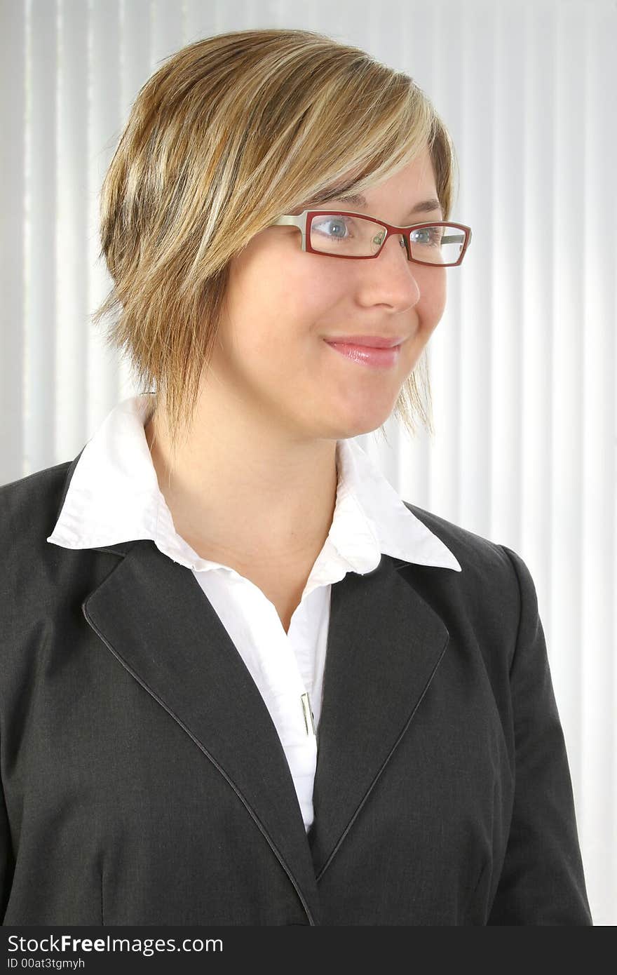 Beautiful smiling business woman with glasses.