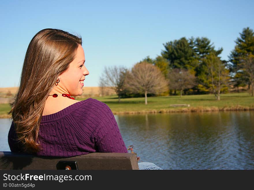 Young woman enjoying a fall day. Young woman enjoying a fall day