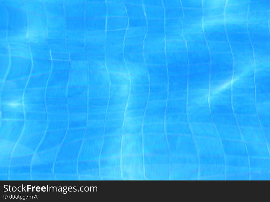 Blue background of a water and tiles found in a pool. Blue background of a water and tiles found in a pool